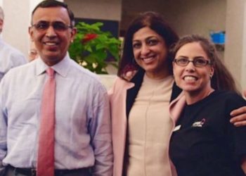 Dr.-Omar Atiq ao lado da família